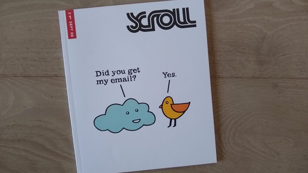 Photo of Scroll Magazine cover, first issue. A cartoon cloud is asking a cartoon bird, "Did you get my email?" and the bird relies "Yes."